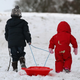 Illustration for article titled Adorable Kids And Adorable Dogs Make The Most Of Snow